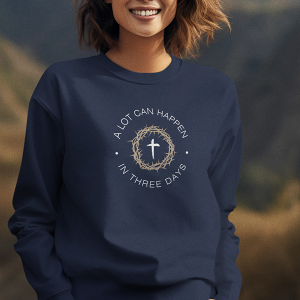 A Lot Can Happen In Three Days Premium Sober Apparel displayed on a model wearing a navy sweatshirt made from preshrunk cotton for a soft and comfortable feel..