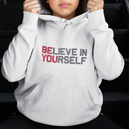 A white BElieve in YOUrself Premium Sober Apparel hoodie features the hidden message BE YOU, inspiring authenticity and confidence.