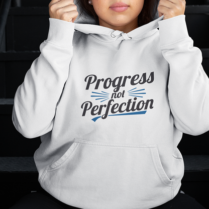 Person wearing a hoodie with the text 'Progress not Perfection' representing Progress Not Perfection Premium Sober Apparel.